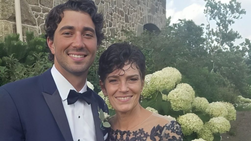 Joey Graziadei with his mother Cathy Pagliaro smiling while posing for a picture