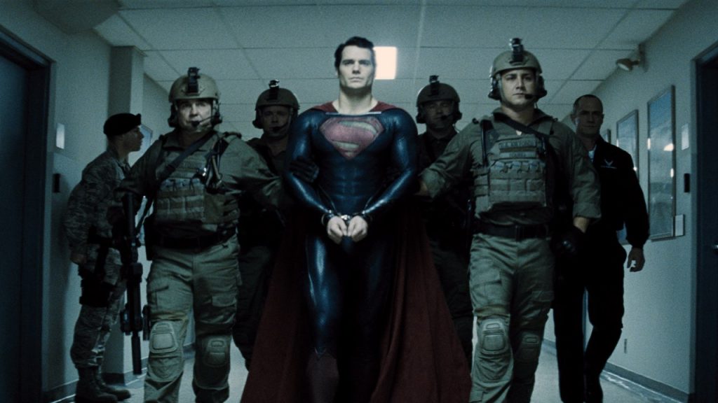 Henry Cavill in handcuffs in a still from Man of Steel