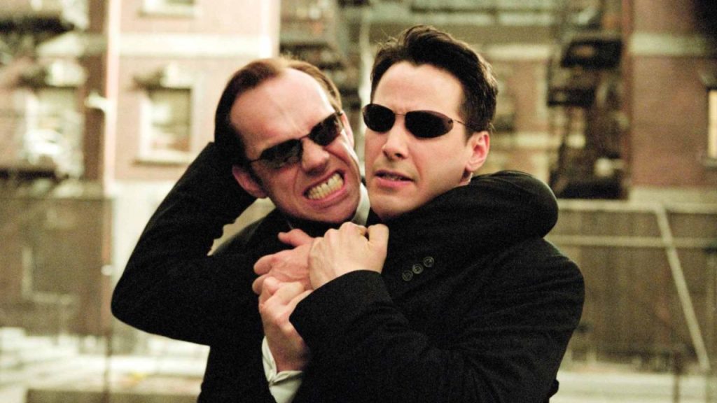 Neo and Agent Smith fighting in The Matrix Reloaded