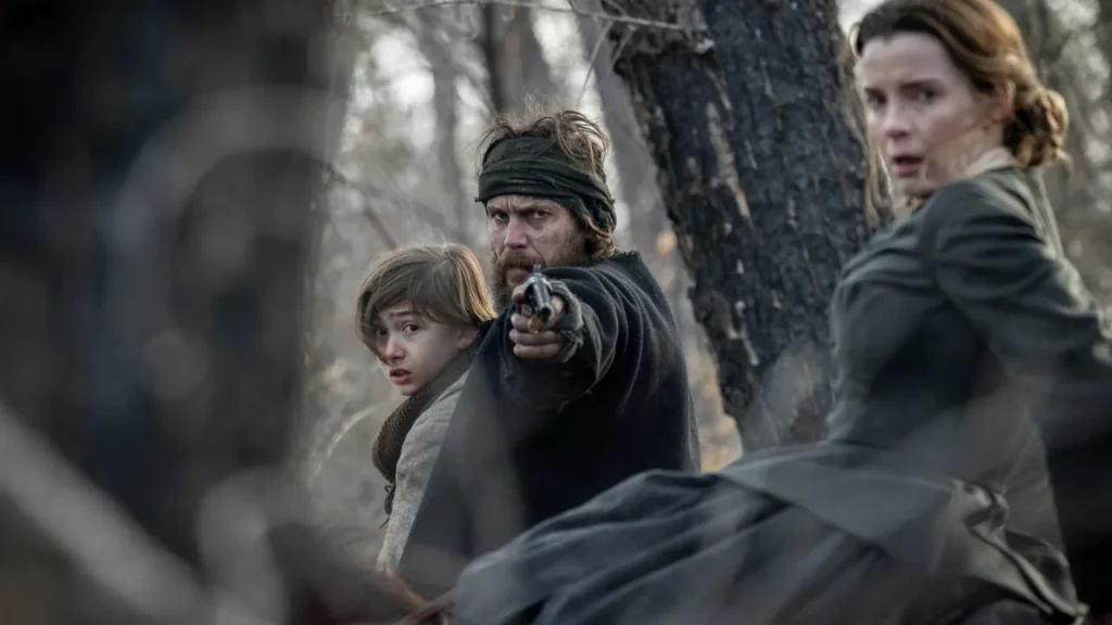 Taylor Kitsch and Betty Gilpin in a still from American Primeval