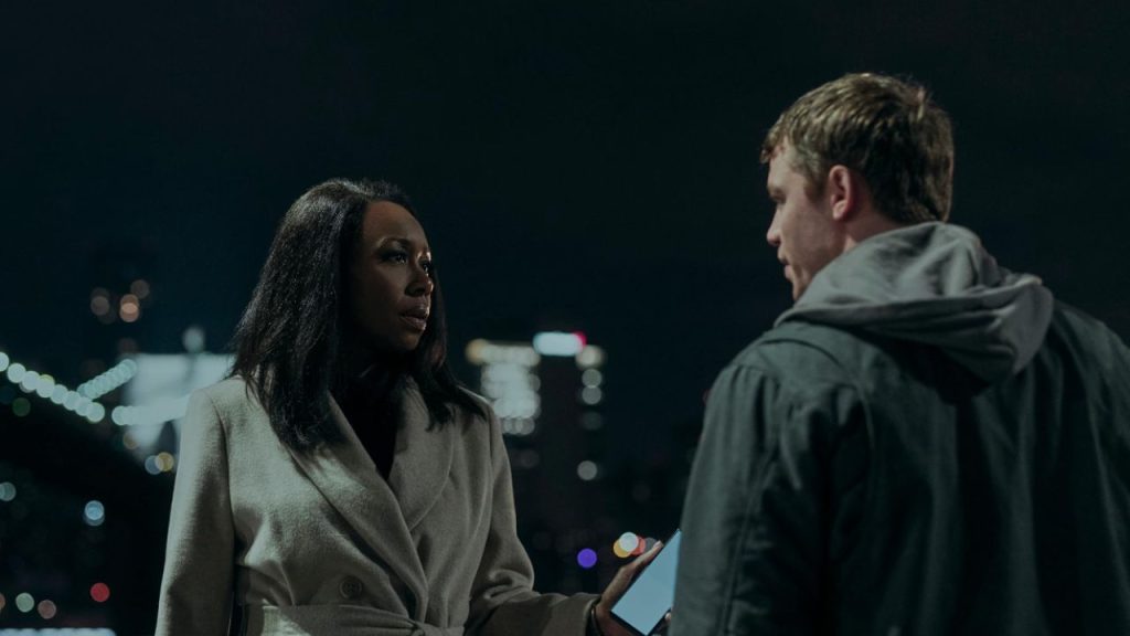 Amanda Warren and Gabriel Basso having a conversation in The Night Agent