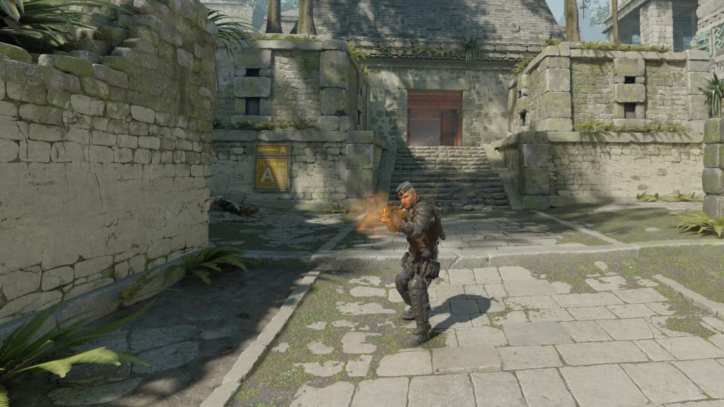 the image shows a player shooting in Counter-Strike 2