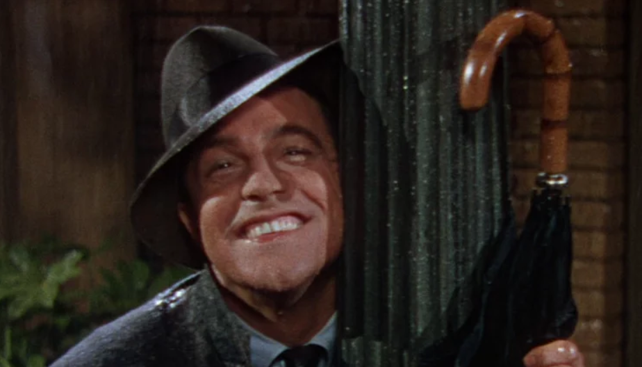 Gene Kelly, also the co-director, smilling in a scene from Singin’ in the Rain.