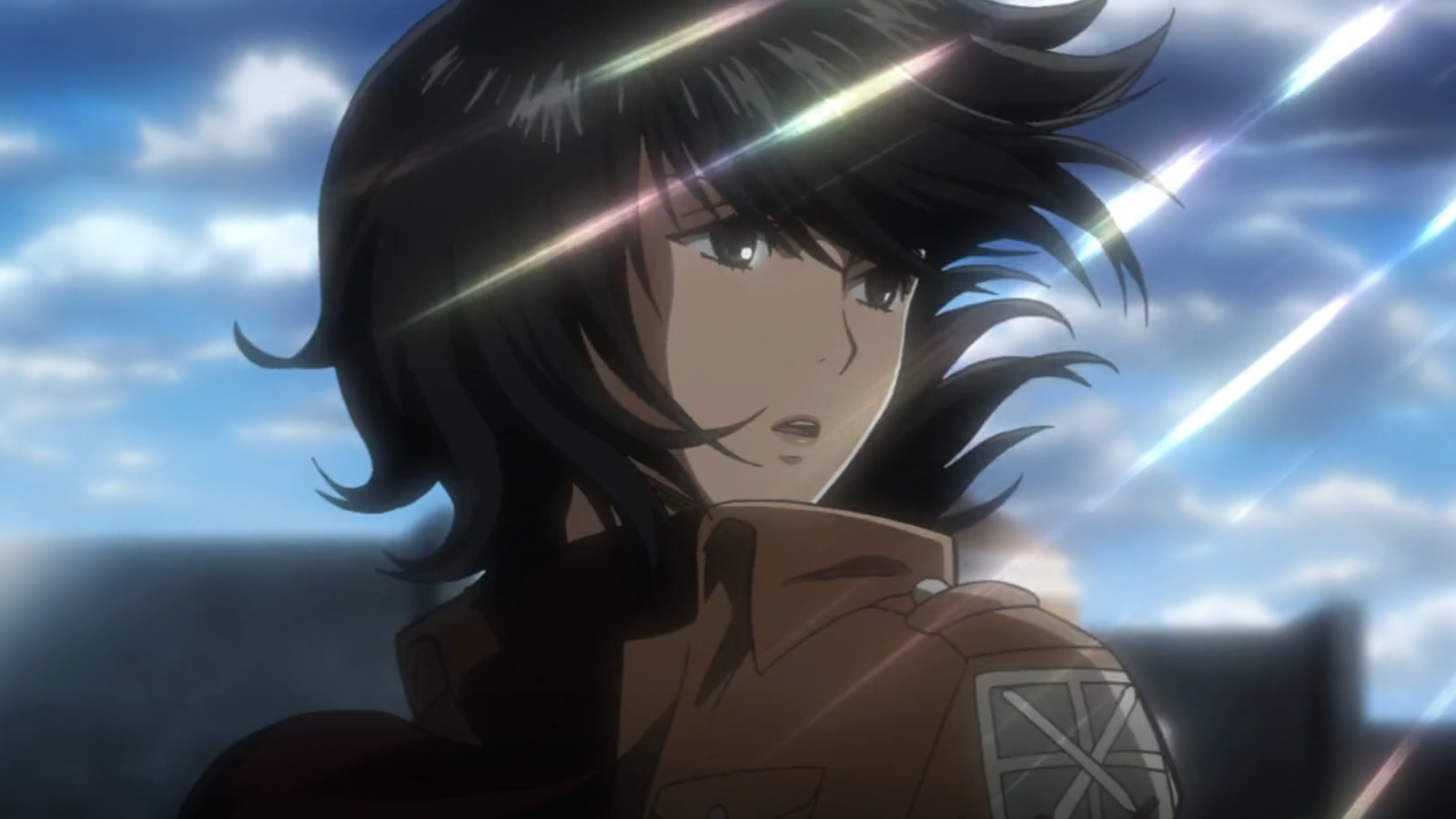 Mikasa’s hair are floating in the air as the sunlight falls on her in a still from Attack in Titan anime 