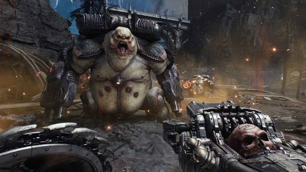 The image shows the skull crushing weapon in DOOM: The Dark Ages