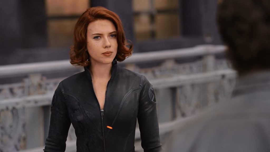 Scarlett Johansson as Natasha Romanoff looking at Hulk in the movie The Avengers.