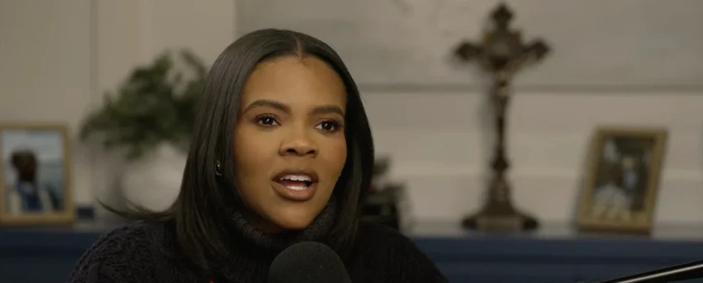 American commentator Candace Owens speaking emphatically into a microphone.