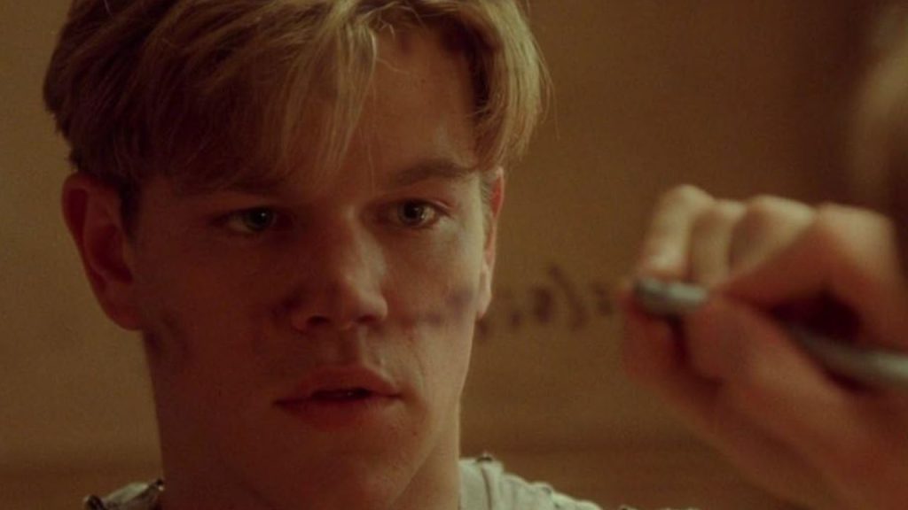 Matt Damon as Will Hunting in Good Will Hunting writing on a mirror.