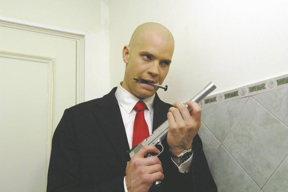 13 Live-Action Movies Inspired by Video Games, Ranked Worst to Best 2 Agent 47 preparing before an assassination.