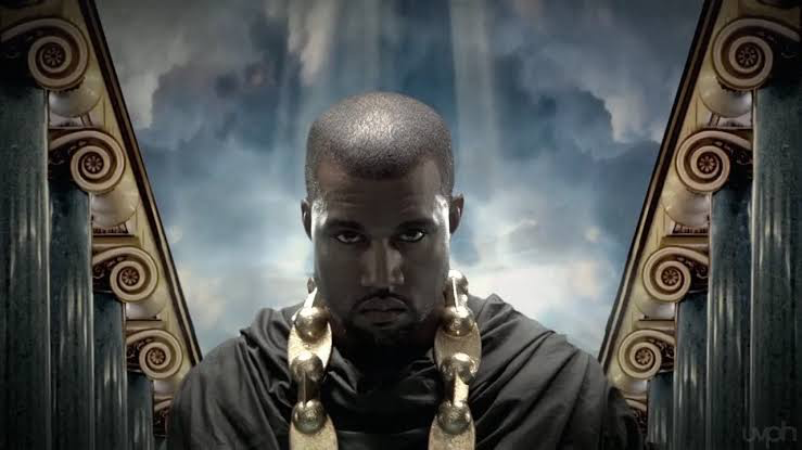 Kanye West appearing like he's standing at the gates of heaven in his music video