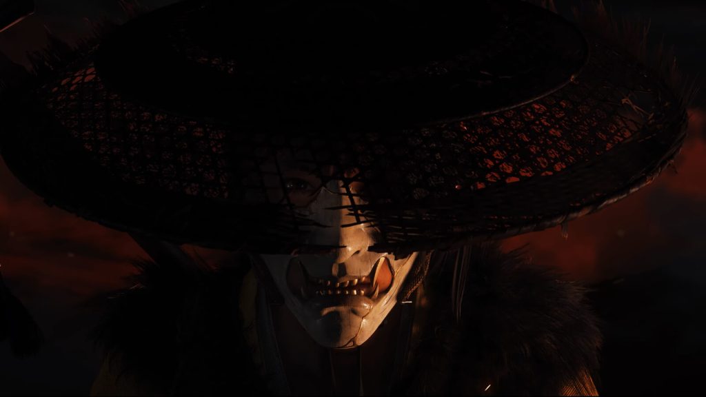 A close-up of Ghost of Yotei protagonist Atsu wearing her mask.