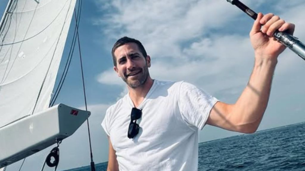 Jake Gyllenhaal overlooking the sea from a boat