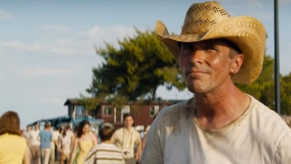 Christian Bale as Ken Miles wearing a cowboy hat