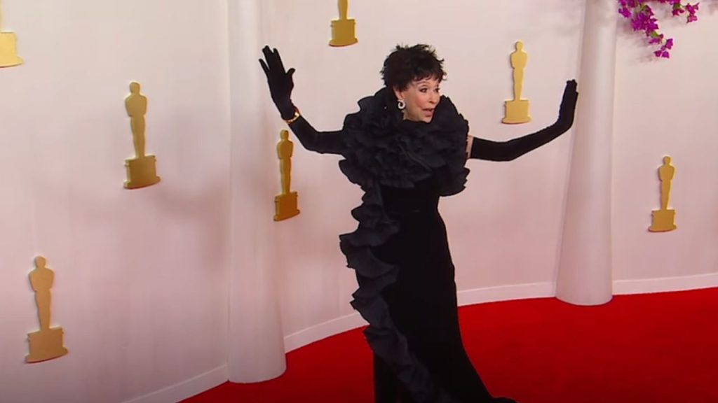 Rita Moreno in Badgley Mischka gown