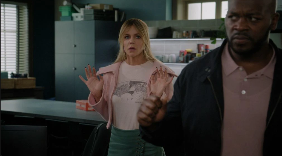 Kaitlin Olson and Anthony Darrell share a tense moment in High Potential