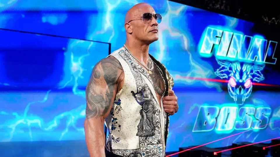 The Rock enters the WWE ring