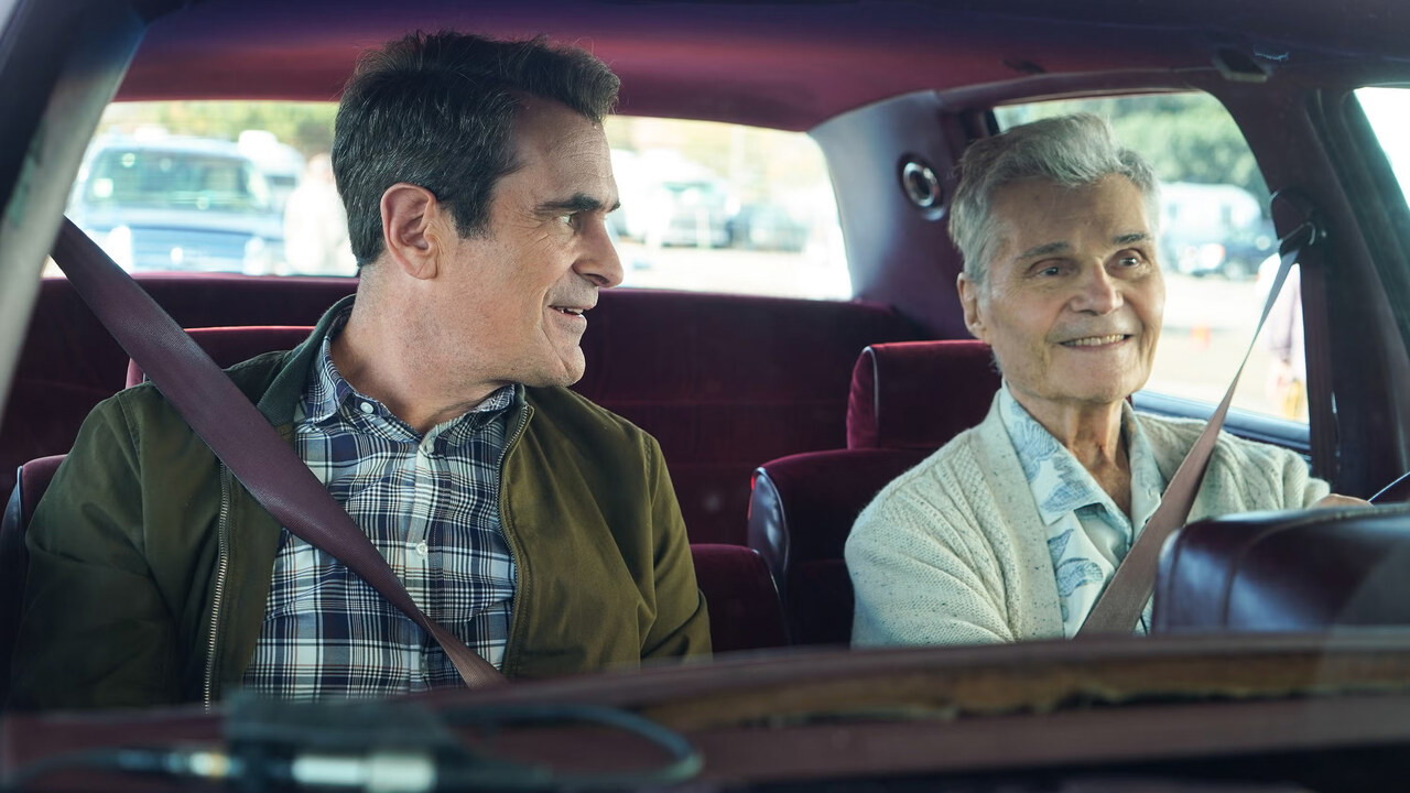 Ty Burrell and Fred Willard as Phil and Frank Dunphy in Modern Family