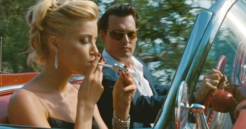 Amber Heard and Johnny Depp in a still from their 2011 collaboration The Rum Diary. 