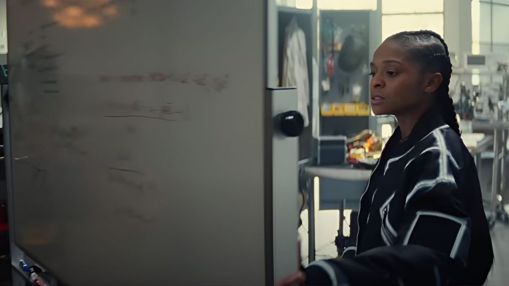 Dominique Thorne looking at a white board in Ironheart