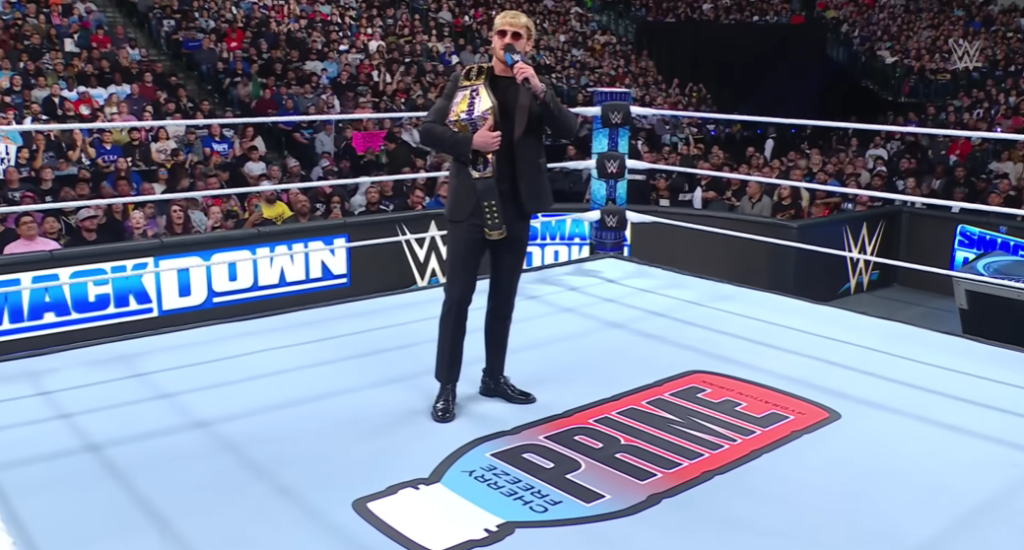 Logan Paul introducing the PRIME logo on the mat