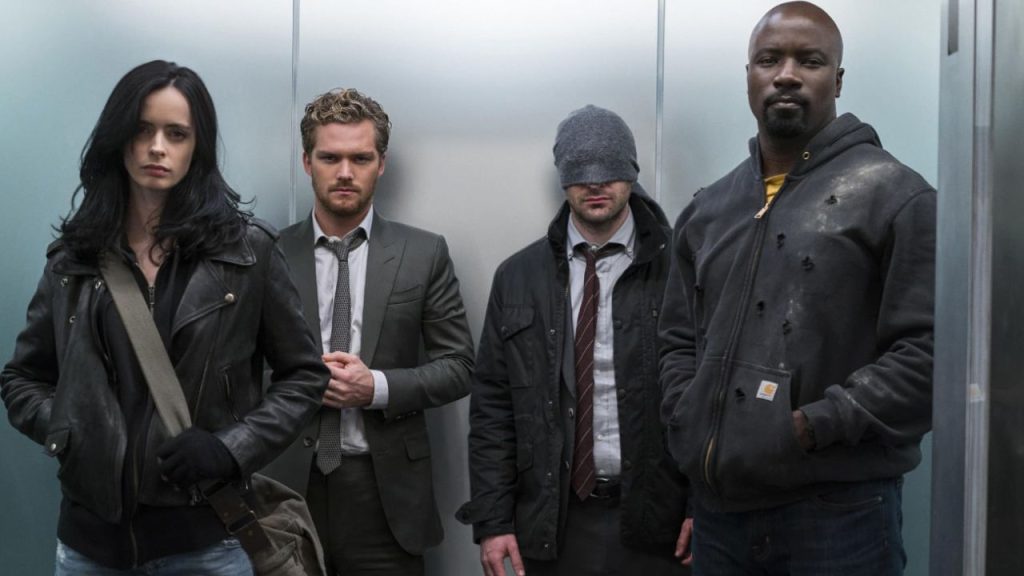 Charlie Cox, Krysten Ritter, Mike Colter, and Finn Jones inside a lift in The Defenders 