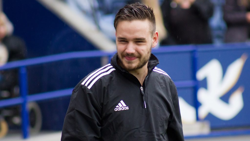 Late musician Liam Payne on the field, during a match.