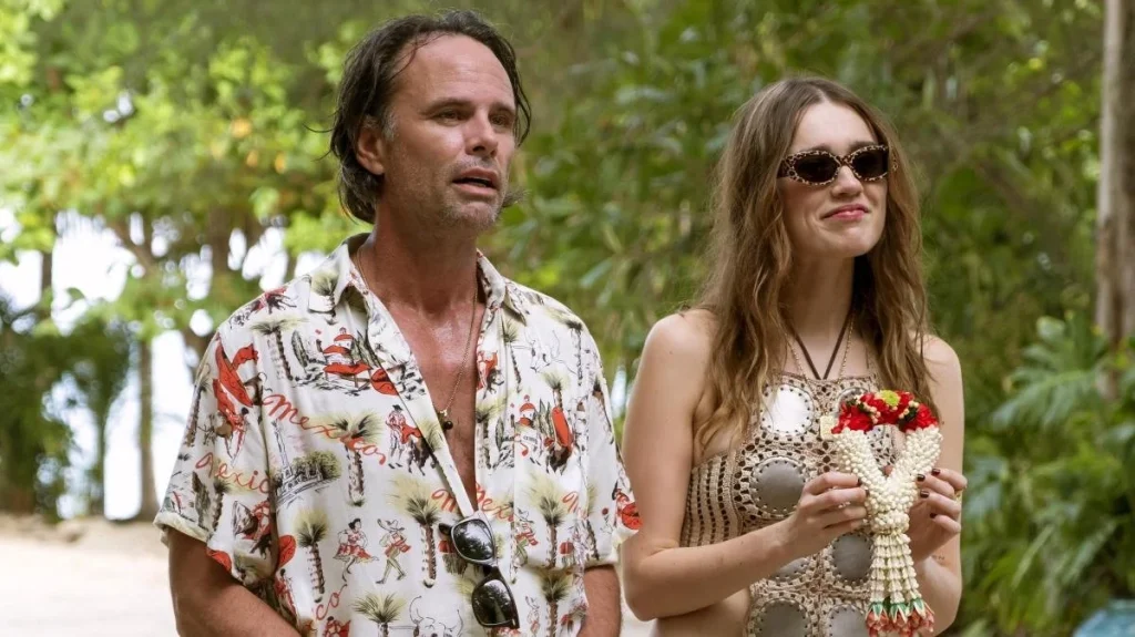 Walton Goggins as Rick Hatchett and Aimee Lou Wood as Chelsea in The White Lotus 