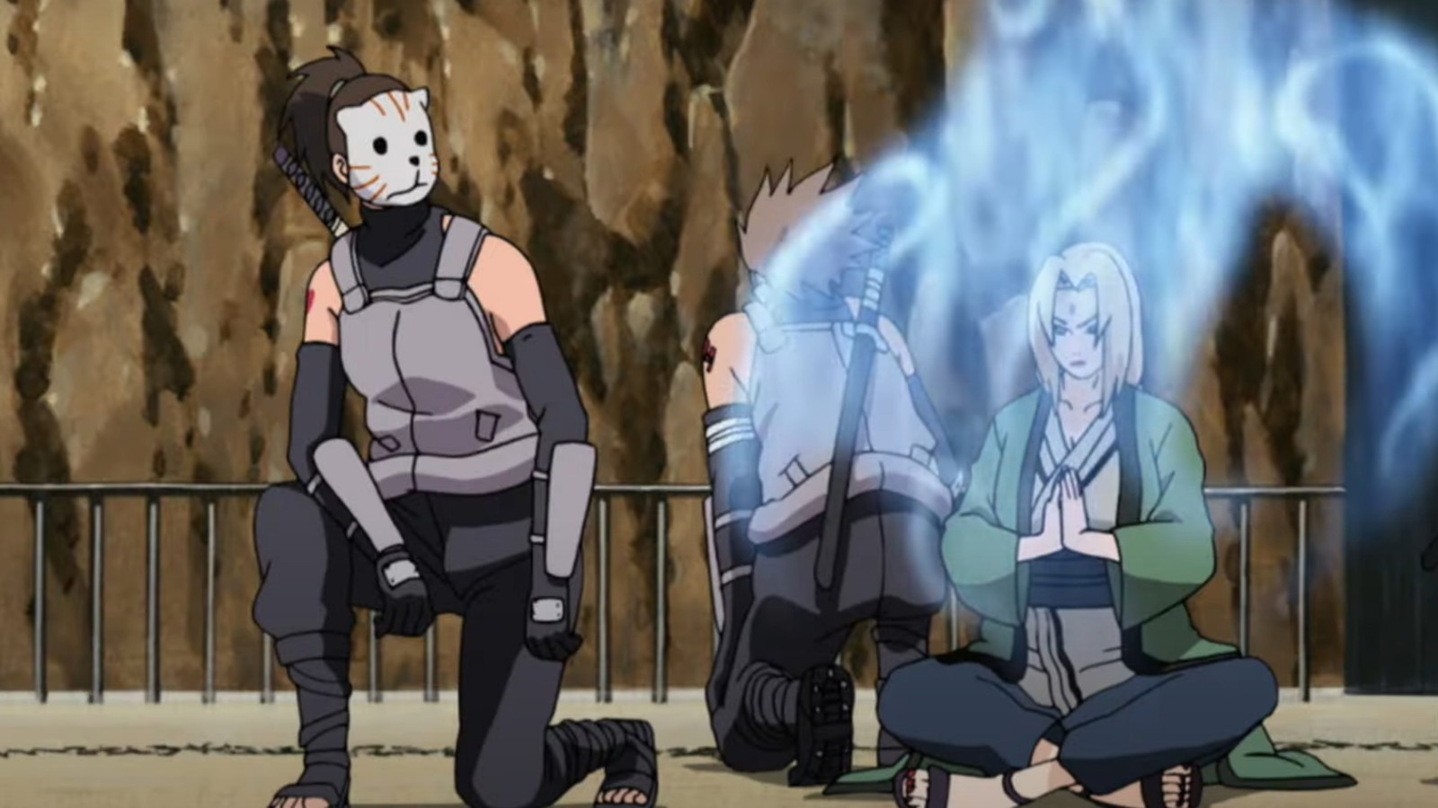 Tsunade is sitting with her hands joined together exuding a blue aura in Naruto 