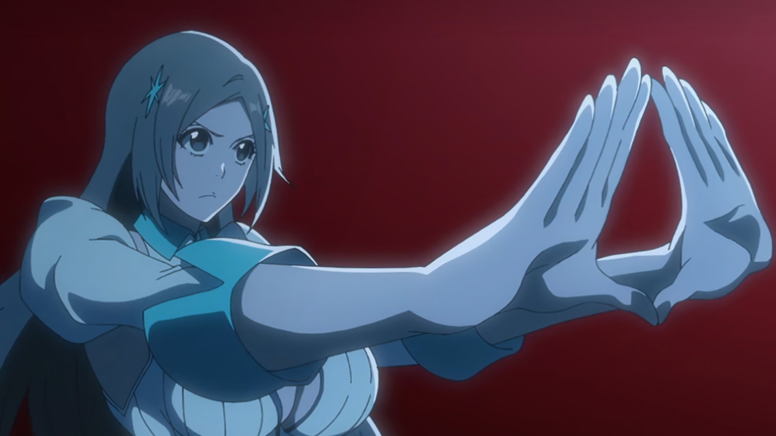 Orihime has her hands joined together in front of her face in Bleach anime