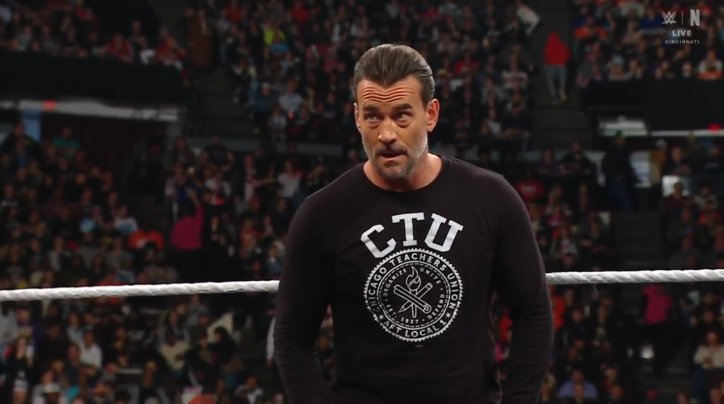 CM Punk wearing a CTU shirt