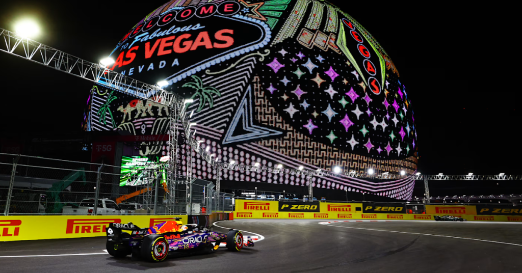 Red Bull car in front of Vegas Sphere. 