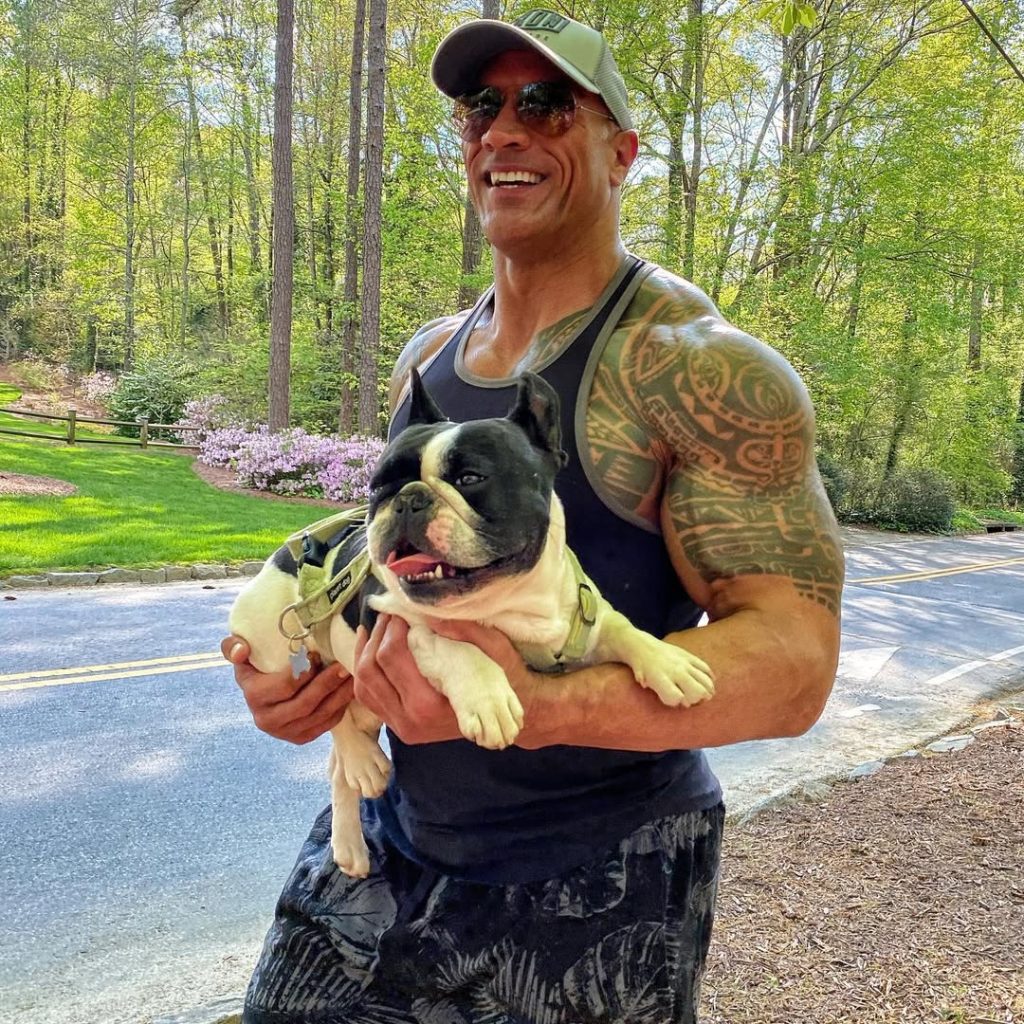 Dwayne Johnson with his dog Hobbs 