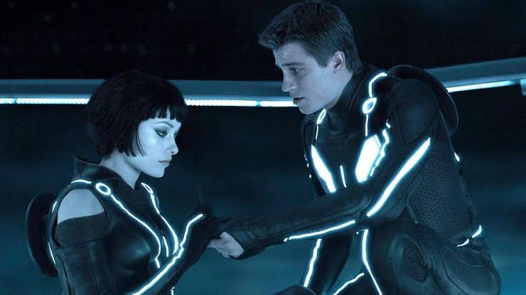 Garrett Hedlund’s Sam Flynn and Olivia Wilde’s Quorra in Tron: Legacy