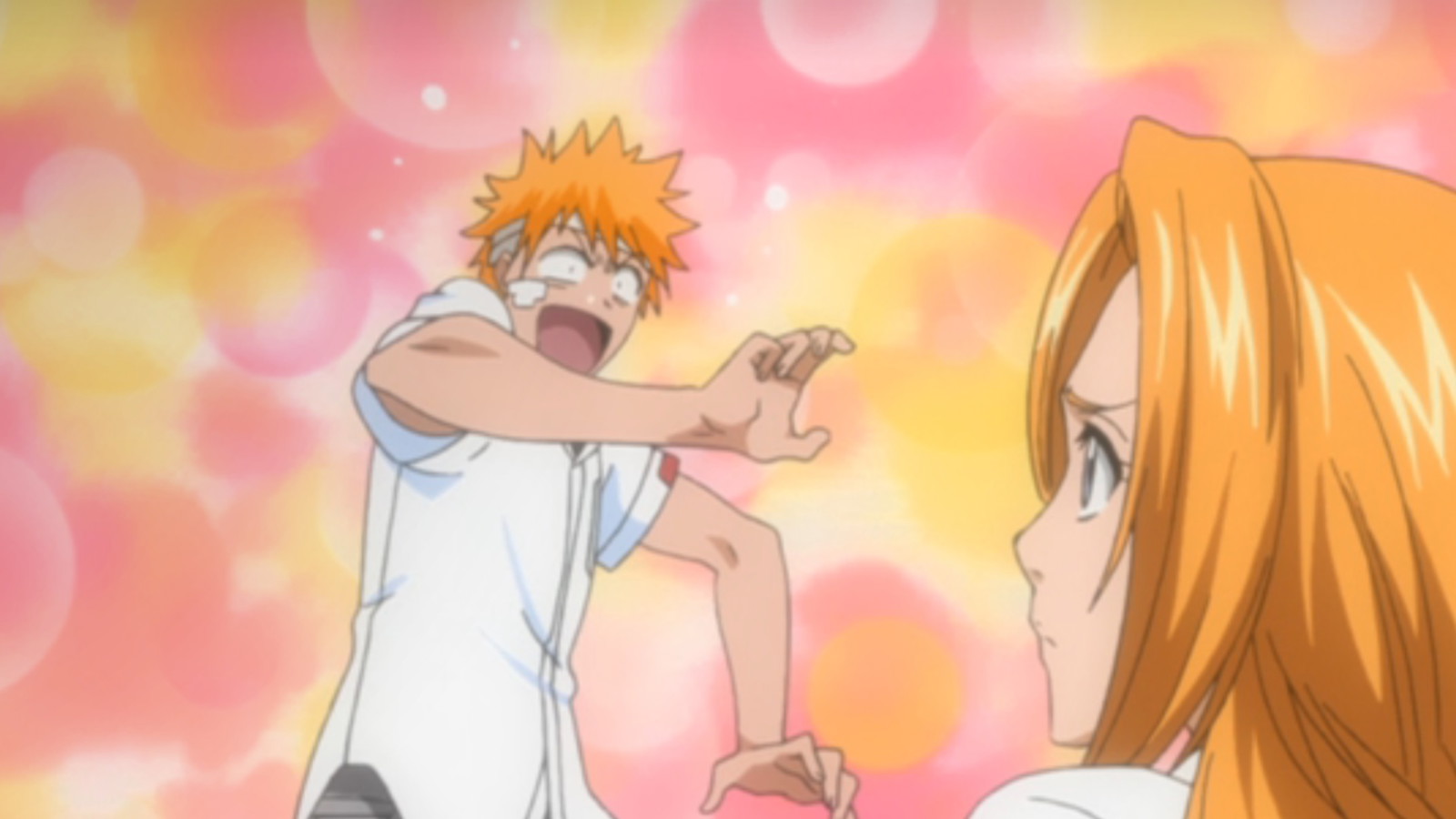 Rangiku is looking at Ichigo who is flustered in Bleach 