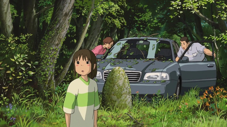 Chihiro and her parents from Spirited Away