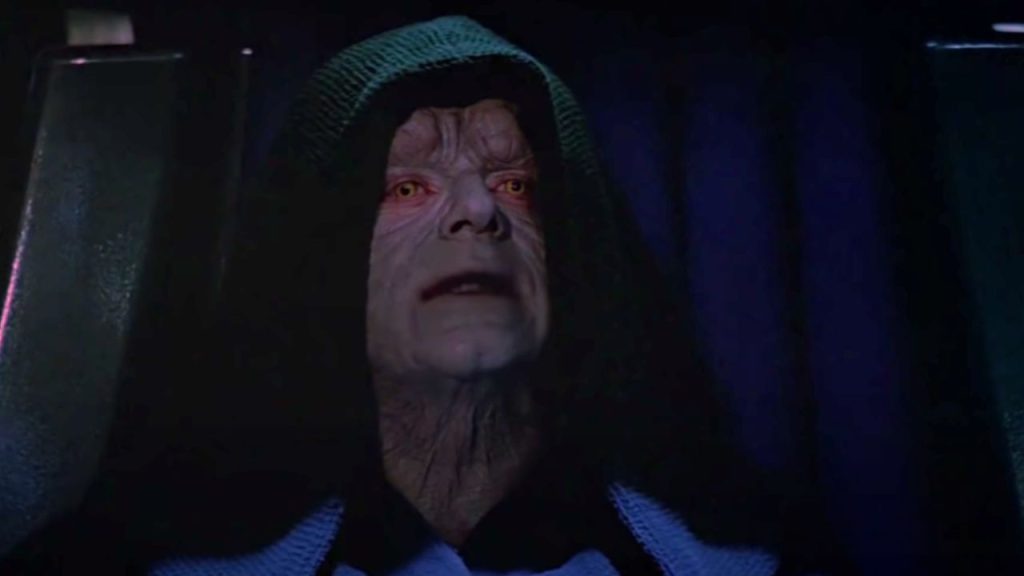 Emperor Palpatine looking at someone while talking in Star Wars