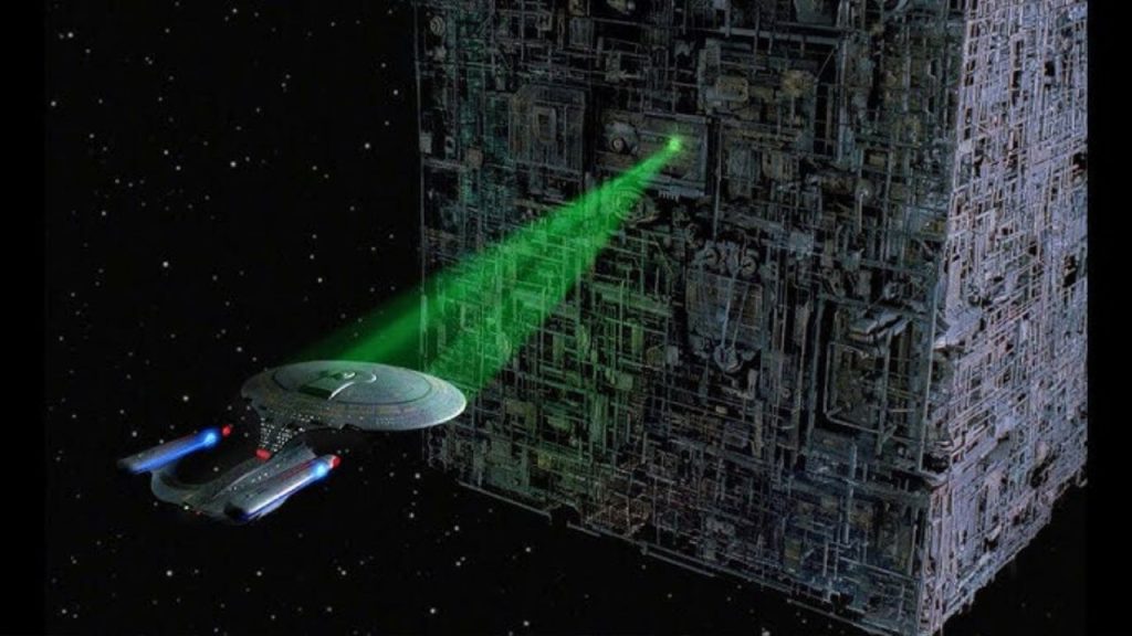 Warp Drive flying into Borg cube in Star Trek