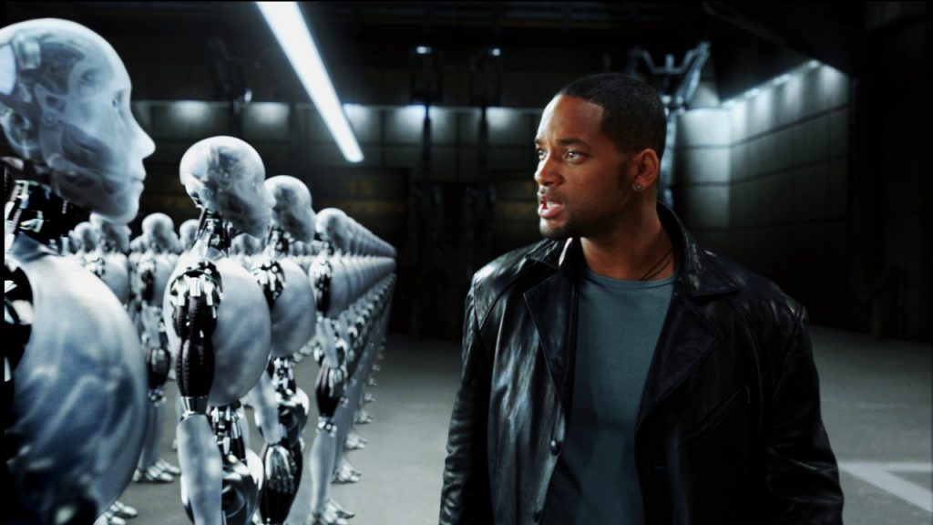 Will Smith in a scene with robots from his popular film I, Robot.