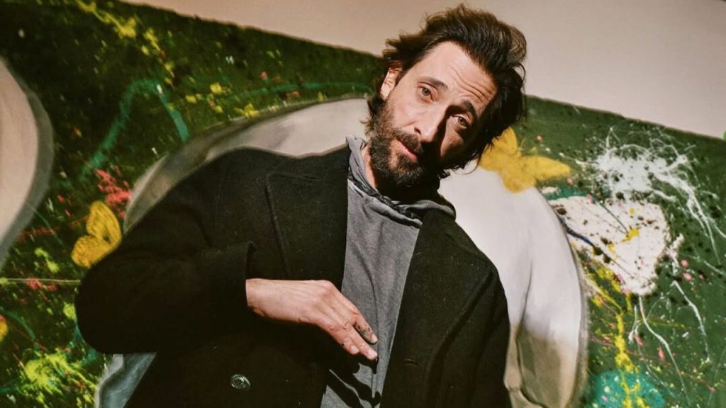 Adrien Brody posing for a picture