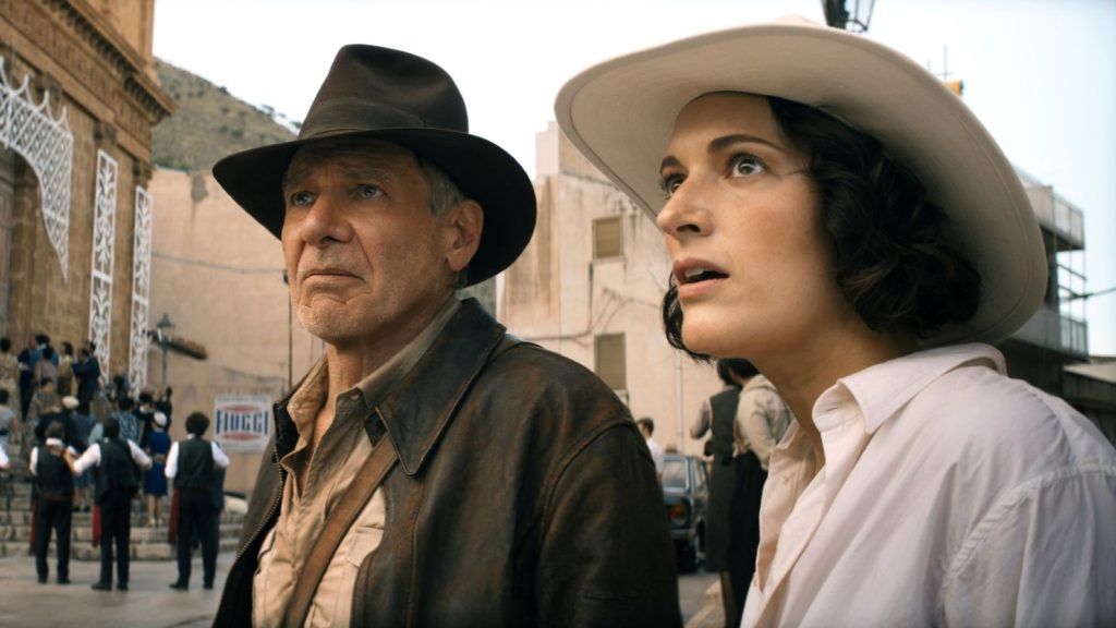 Harrison Ford and Phoebe Waller-Bridge look in awe in a scene