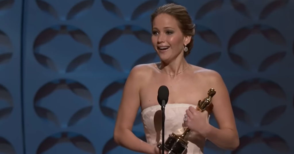 Jennifer Lawrence holding the Oscar.