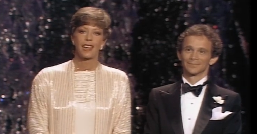 The presenters accept the award for John Gielgud.