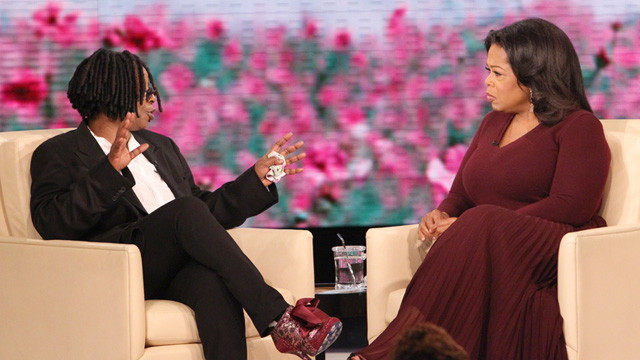 Whoopi Goldberg and Oprah Winfrey on stage