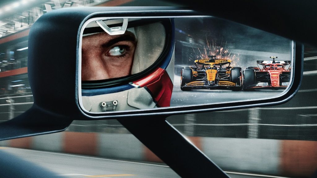 A dramatic promotional image of F1 Drive to Survive showing a close-up of a driver's eye in a side mirror, with racing cars reflected in the mirror.