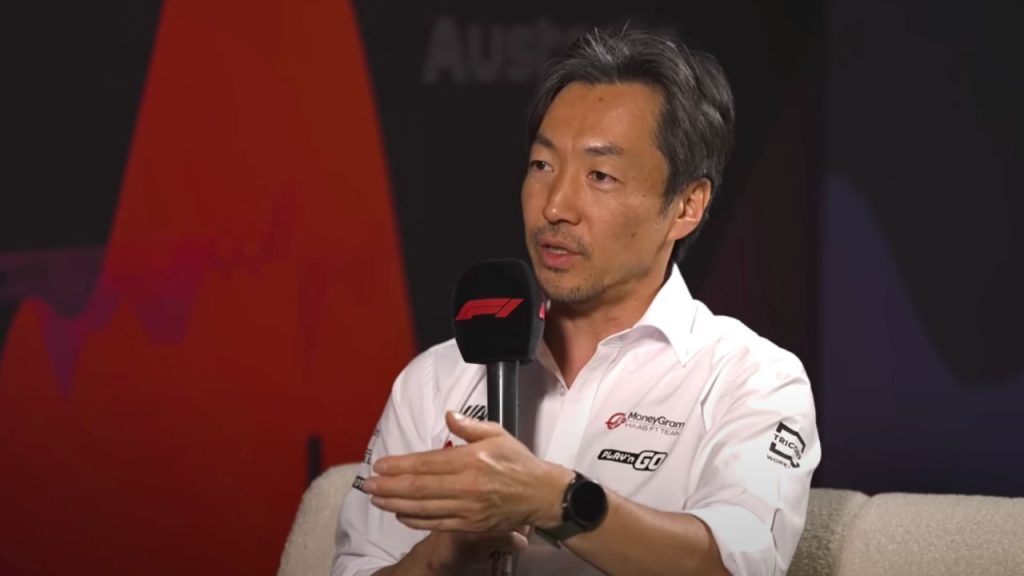 Ayao Komatsu speaking during an interview