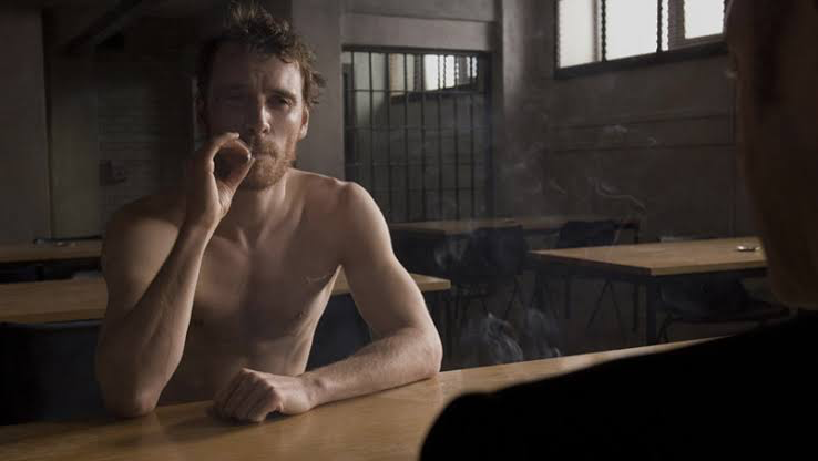 Michael Fassbender topless and smoking a cigarette in the 2008 thriller drama Hunger 