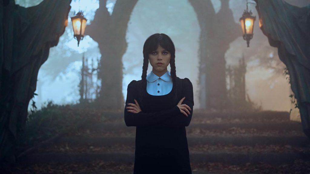 Jenna Ortega standing menacingly in Wednesday