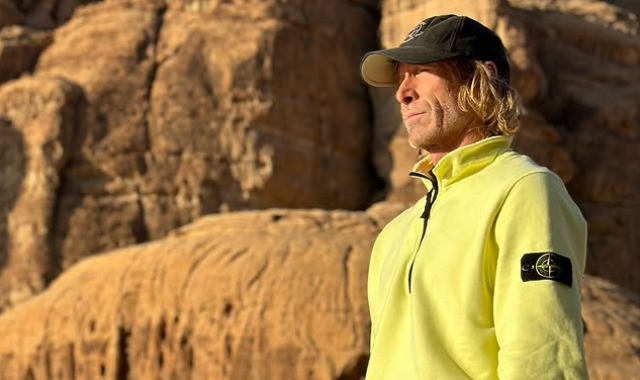 American filmmaker Michael Bay looking over a desert.