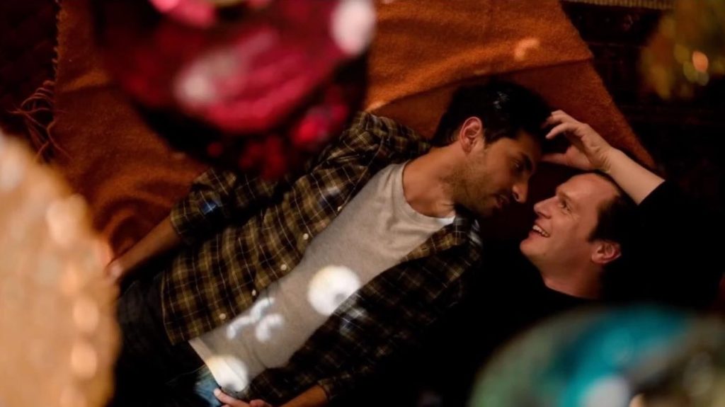 Karan Soni and Jonathan Groff sharing a moment in A Nice Indian Boy trailer 