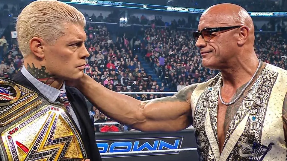 Cody Rhodes with Dwayne Johnson on the ring